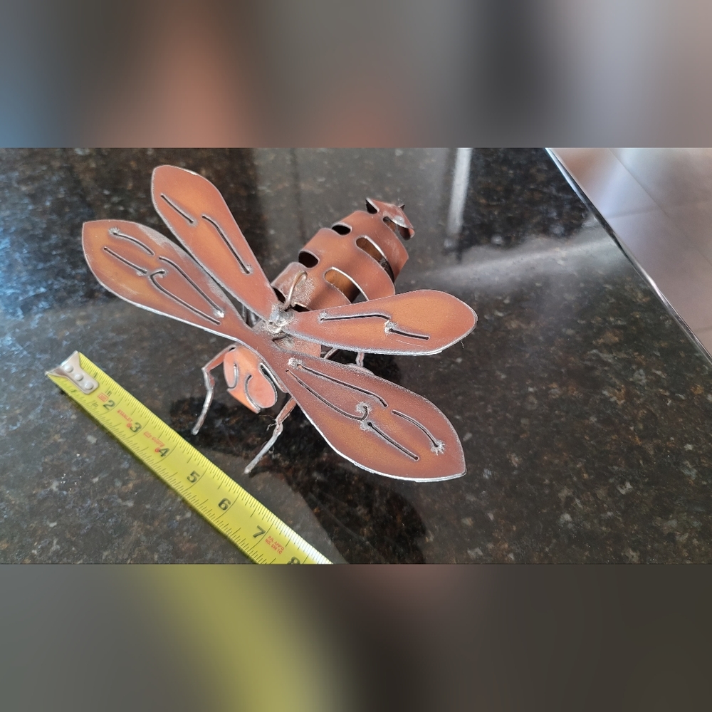 Metal bee sculpture